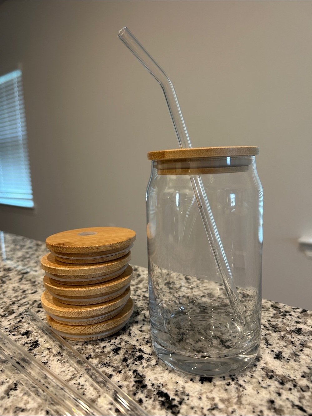 6 total can-shaped glasses with bamboo lids and glass straws